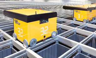 At YellowCube, 35 robots manage 32,000 containers for small items.